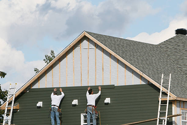 Professional Siding Repair technician working in Hampstead, NC